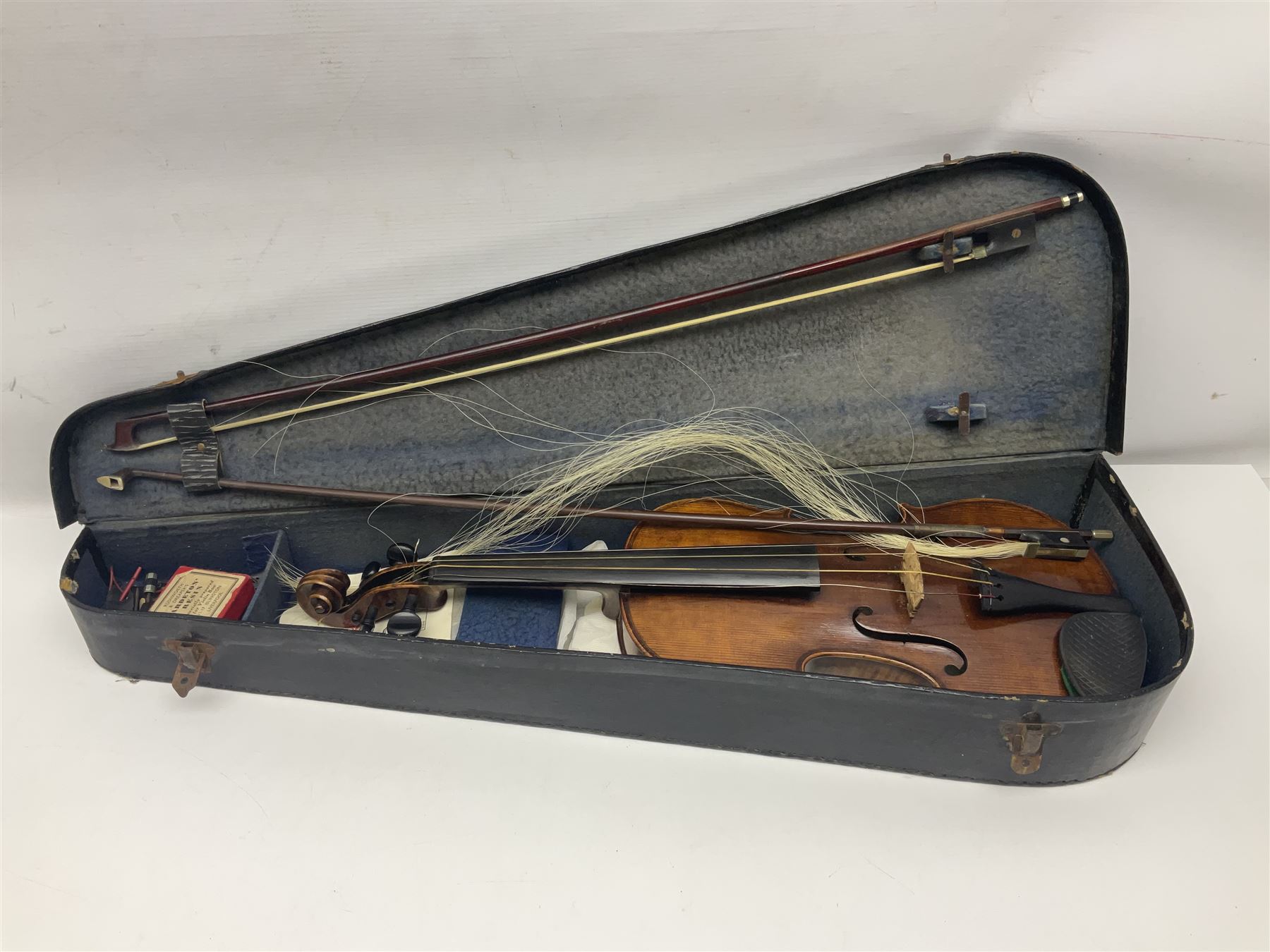 German trade violin c1900 with 35.5cm two-piece maple back and spruce top; bears label 'Made in Germany Apollo Class 6 No.2132' L59cm; in carrying case with two bows