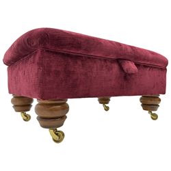 Duresta - traditional shape armchair upholstered in burgundy red velvet, on square tapering front supports (W88cm, H85cm, D103cm); together with a matching rectangular footstool with hinged seat, on turned feet with brass castors (73cm x 54cm, H38cm)