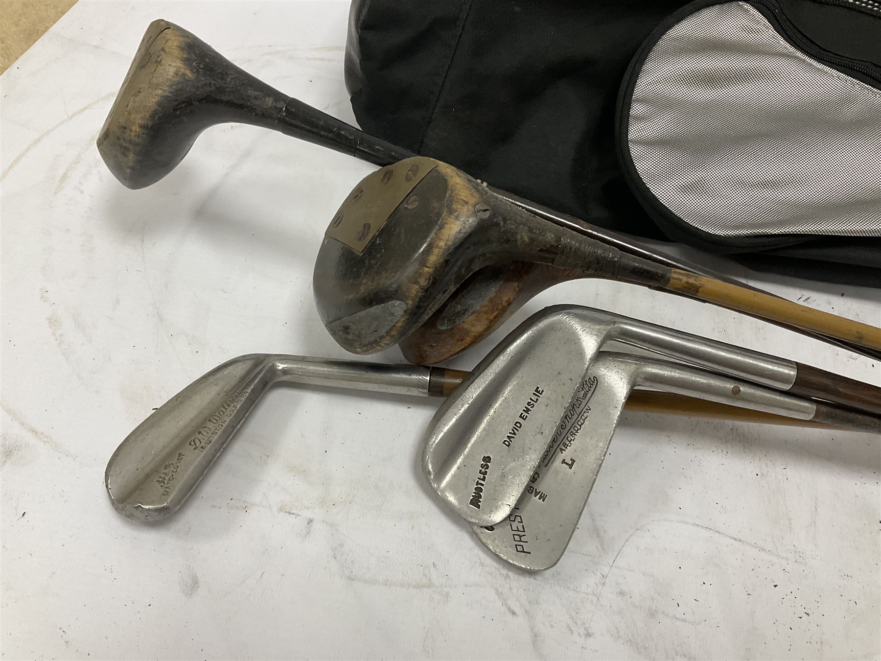 Quantity of golf clubs to include Prestwick Mashie, Ben Sayers and Spalding examples etc in Slazenger soft shell carrying bag