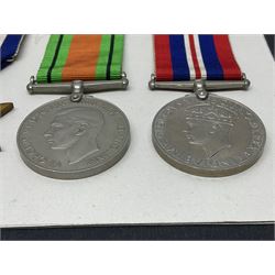 Representative display of WWII Campaign Stars and Medals comprising Burma Star, Italy Star, France & Germany Star, Defence Medal and War Medal 1939-1945; together with the corresponding group of miniatures; all with ribbons