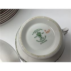 Coalport and Crown Staffordshire hunting scene part teawares, to include eleven teacups and saucers of various sizes, two cake plates, two jugs, four sugar bowls, fourteen dessert plates, etc (68)