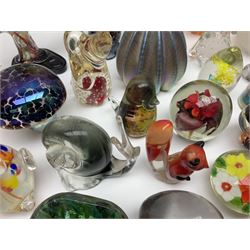 Robert Held iridescent art glass sea urchin paperweight, signed to underside, together with Murano glass clown and a collection of other glass paperweights and animals, etc 