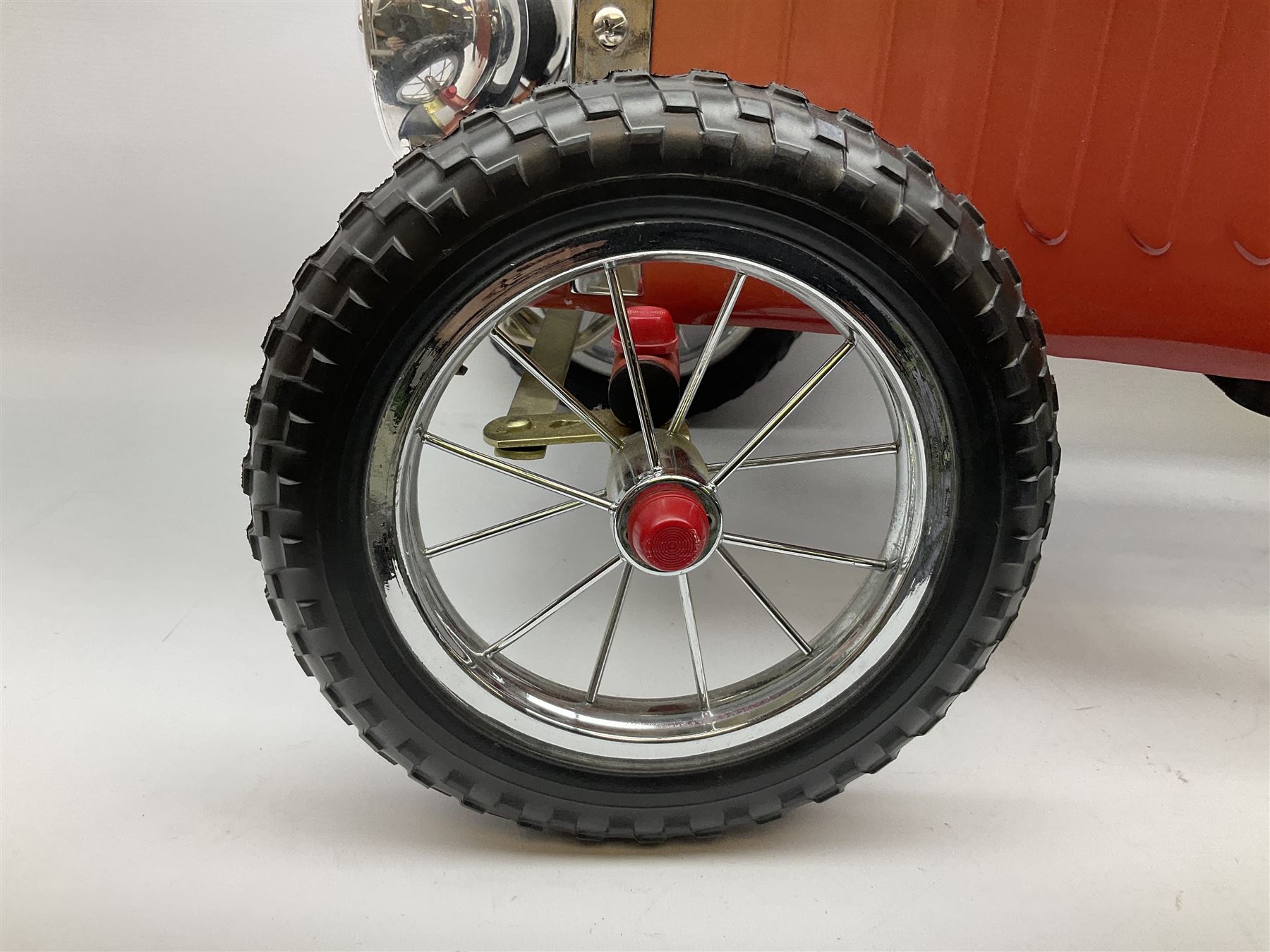 Red child's tin-plate pedal car with chrome detail, by Posh Paddles, Scarborough, H56cm, L80cm