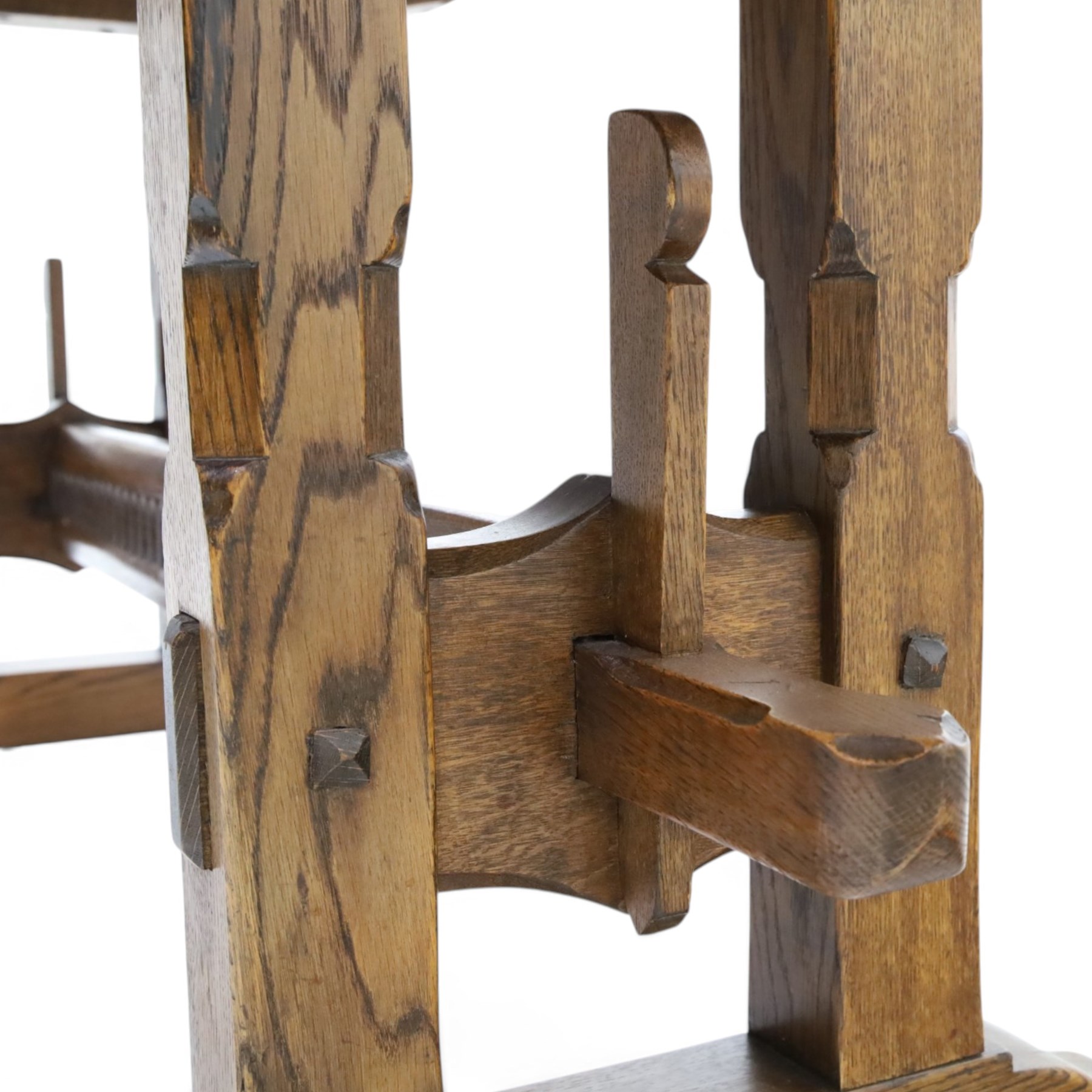 Rupert Griffiths for Monastic Woodcraft - oak 6ft refectory dining table with set six (4+2) matching chairs, rectangular top with arcaded frieze, with trestle base with further arcaded carved stretchers, chairs with carved rails and finials, leather wrapped seats with stud detail, turned supports united by carved stretcher