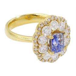 18ct gold radiant cut Ceylon sapphire and round brilliant cut diamond cluster ring, hallmarked, sapphire approx 1.20 carat, total diamond weight approx 1.40 carat