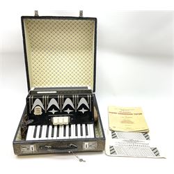 GDR Firotti piano accordion with black and silver case, sixteen keys and forty-eight buttons L38cm; in simulated reptile skin case with sheet music