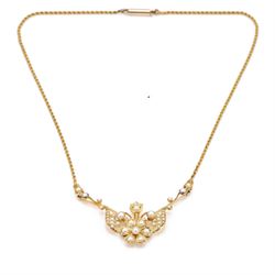 Edwardian gold pearl floral necklace, the openwork stylised floral and scroll mount set with split and seed pearls, to a rope twist chain necklace, in a tooled leather and blue velvet box