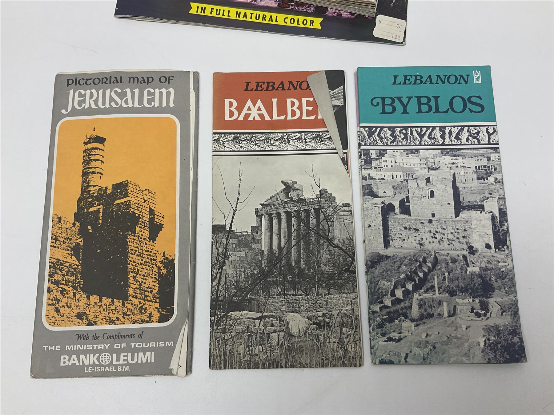 Seven pen knives, two lighters, including one Ronson example and a collection of postcards