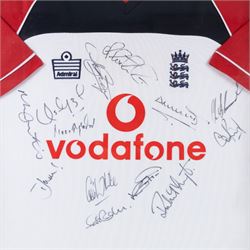 Signed 2002/2003 season England Cricket shirt, signed by thirteen England players including Marcus Trescothick, Darren Gough and Craig White, contained within a glazed wooden display case, frame H96cm