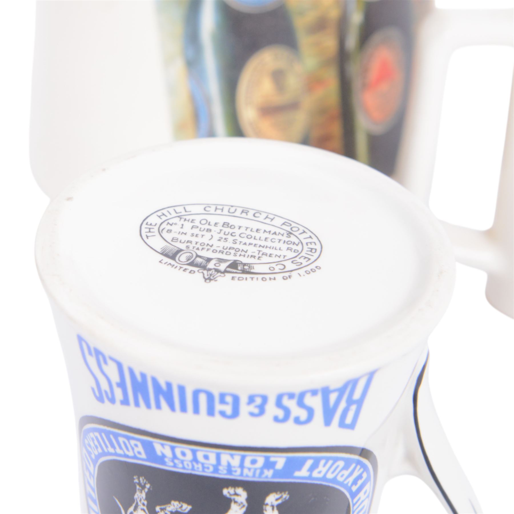 The Hill Church Potteries Bulldog Bass and Guinness Robert Porter & Co water jug, together with another Robert Porter and Co jug and Lovely Day for a Guinness jug, largest H23cm