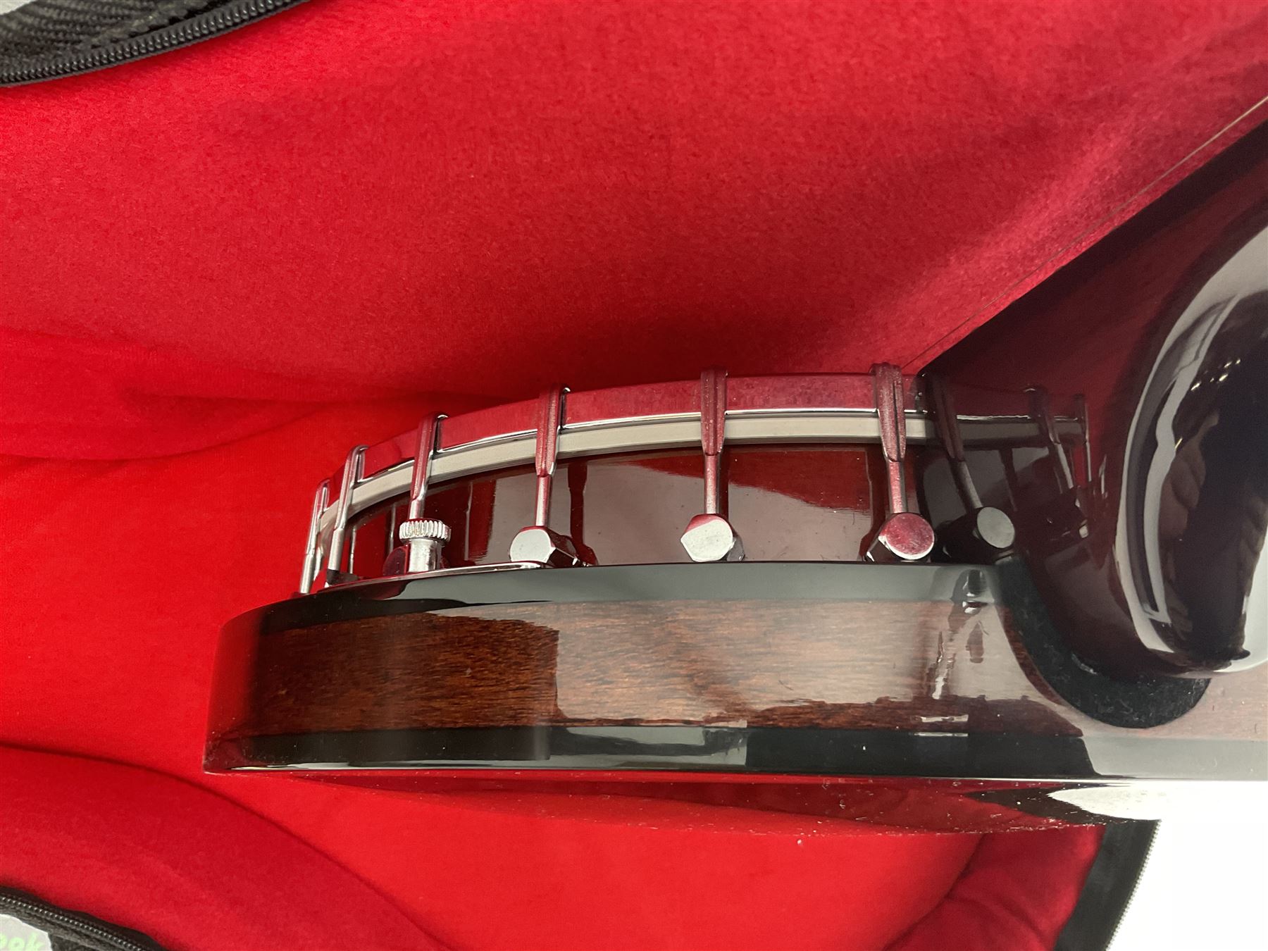 Rally five-string banjo with mahogany solid back L101cm in soft carrying case; and Brunswick Model BF200 acoustic guitar L103cm; with small quantity of instructional DVDs and booklets