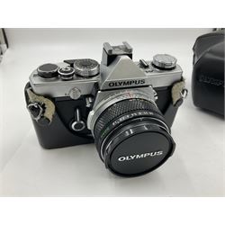 Olympus M-1 camera body, serial no. 110865, circa 1972, with ' Olympus M-System F.Zuiko Auto-S 1:1.8 f=50mm' lens, serial no. 105152, in leather case 