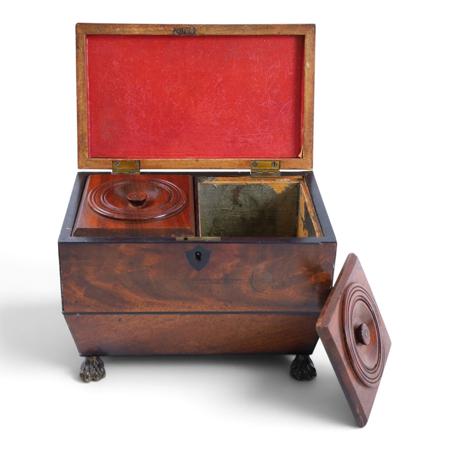 Regency mahogany sarcophagus tea caddy, the hinged lid opening to reveal two compartments, upon paw feet, H18cm