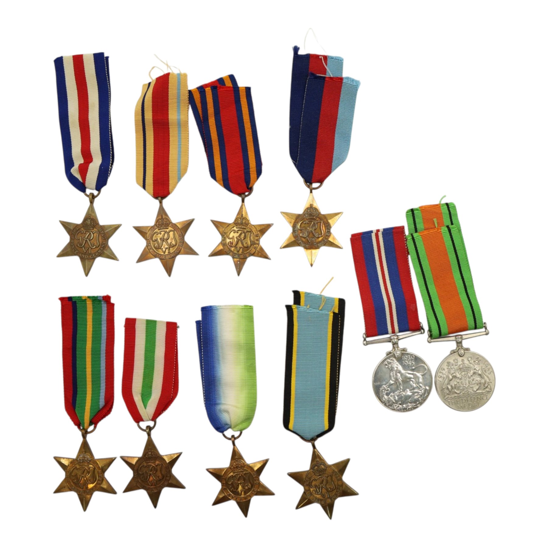 WWII British medals, comprising War medal, Defence medal, 1939-1945 Star, Burma Star, Atlantic Star, France and Germany Star, Italy Star, Pacific Star