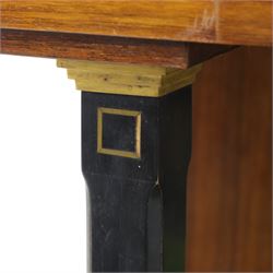 Continental Art Nouveau cocktail cabinet, the stepped cornice over a glazed upper section with panelled doors, enclosing fitted shelf, the central section with mirrored back and green baize serving surface flanked by ebonised and gilt detailed pilasters, the base fitted with cupboard doors inlaid with stylised foliate and geometric motifs, on a plinth base