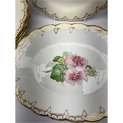 A 19th century part dessert service, comprising eight plates and one tazza, hand painted with botanical studies and a gilded border to rim, plates D21.5cm, tazza L27cm.