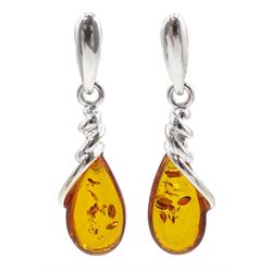 Pair of silver Baltic amber pear shaped pendant earrings, stamped 925 
