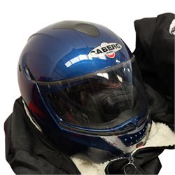 Collection of motorcycle clothing including MCS jacket, two pairs of gloves and two helmets 