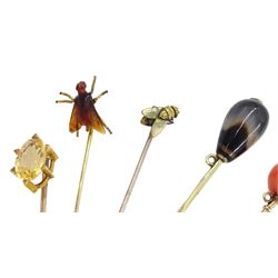Victorian and later gold stick pins including gold coral, turquoise, pearl, fly and citrine and two white metal agate and insect pins