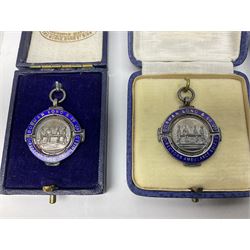 Four St John's silver fobs, together with two silver Directors Ambulance shield fobs and two other St Johns items 