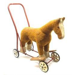 Pedigree push along plush covered horse 1950s-60s with red tubular metal framework and beech foot rests H25