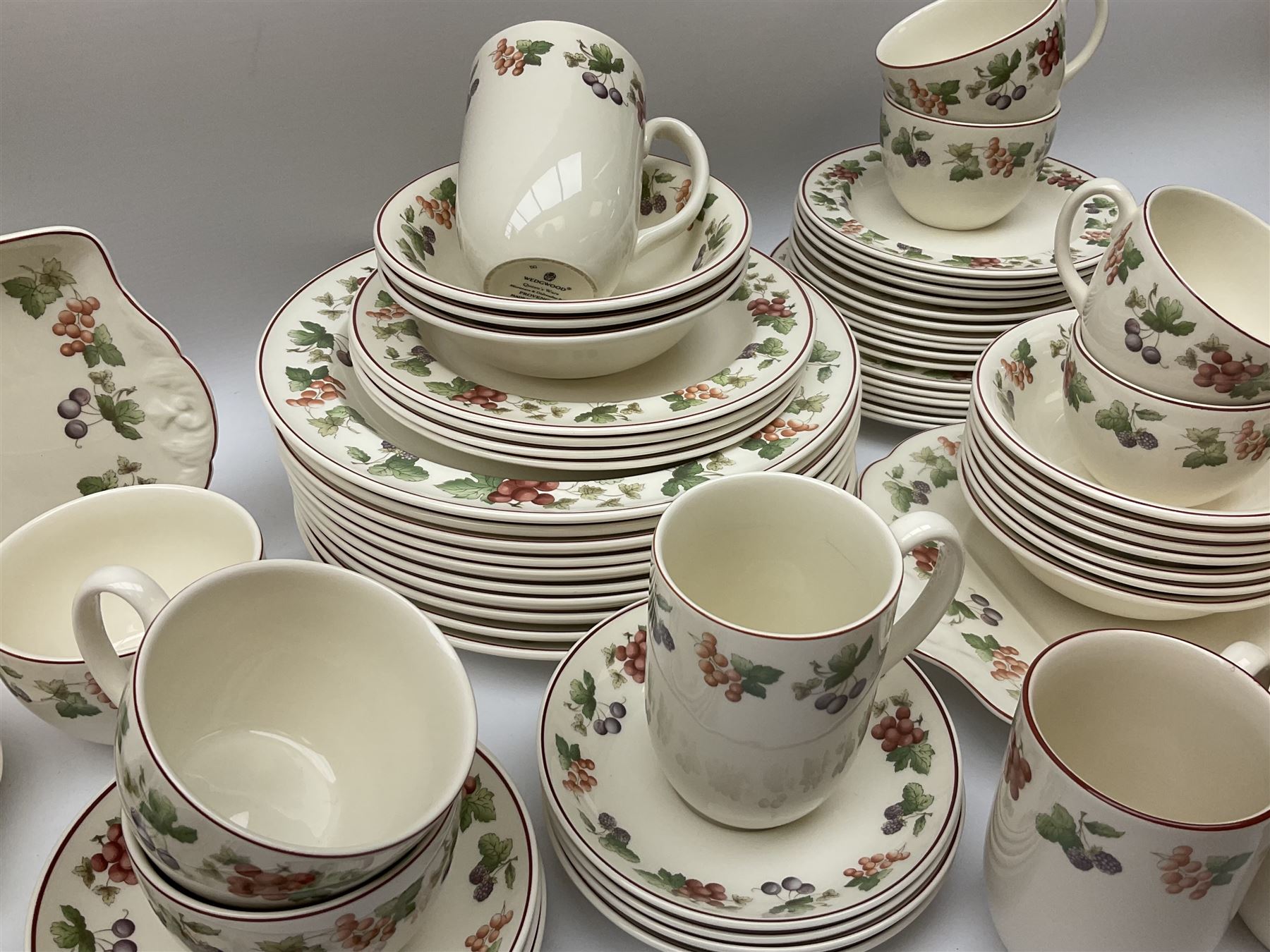 Wedgwood Queens Ware tea and dinner wares in Provence pattern, including ten cups and saucers, milk jug, butter dish with cover, ten dinner plates, ten bowls and ten side plates etc (71), together with Royal Doulton tea wares in Canton pattern, comprising six cups and saucers, milk jug, open sucrier and six dessert plates.    