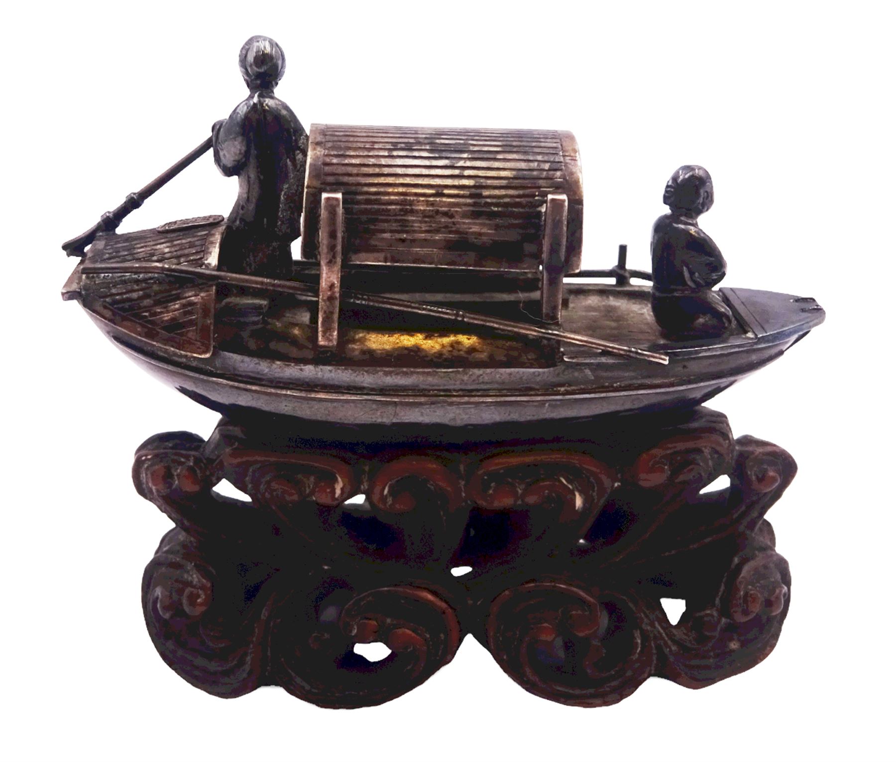Chinese miniature silver model of a junk, with character mark to stern, mounted upon a carved wooden stand, overall H5cm L6.5cm