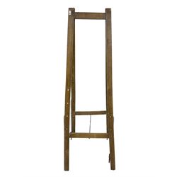 Beech folding easel, trestle framed with adjustable height pegs