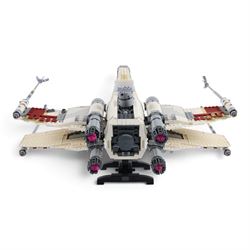 Three Lepin Star Wnrs built models, comprising Red Five X-Wing Starfighter no. 05039, Millennium Falcon no. 05132 and Super Star Destroyer no. 05028
