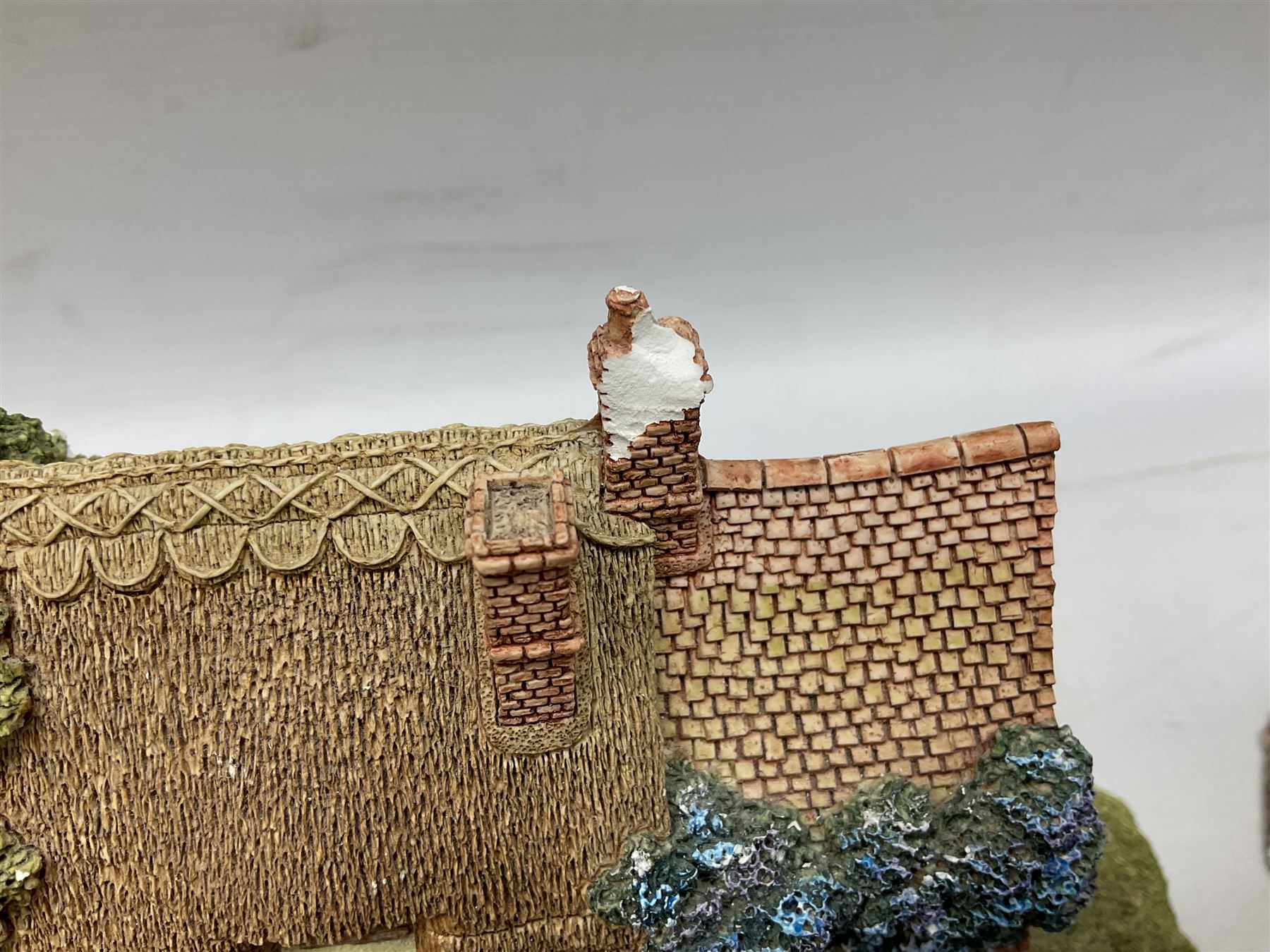 Sixteen Lilliput Lanes, to include The Golden Jubilee, Round Tower - Windsor Castle, Castle of the Golden Chalice, Travellers Rest, with box and deed,  Summer Days, Sunshine Creek, Writing with Lewis Carol, with box and deed,  etc 