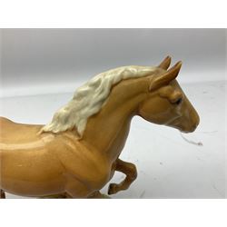 Beswick figure of cantering Palomino horse on base model no 1374, with impressed and printed mark beneath, H18cm
