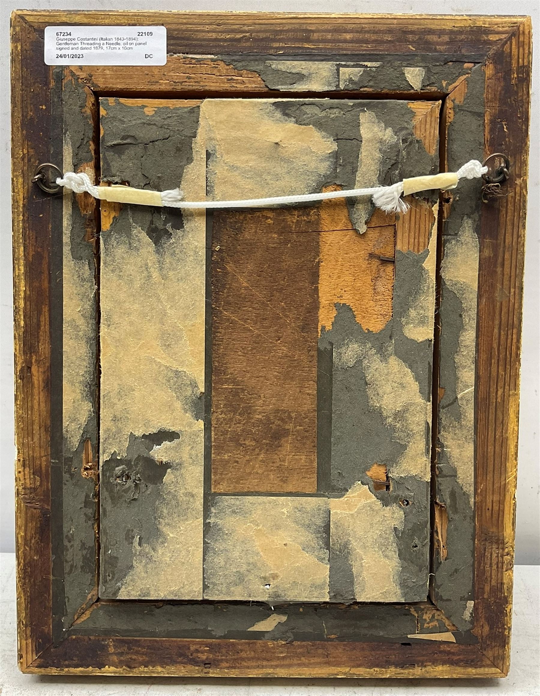 Giuseppe Costantini (Italian 1843-1894): Gentleman Threading a Needle, oil on panel signed and dated 1879, 17cm x 10cm