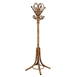  Mid 20th century bamboo hat and coat stand, scrolled top with shaped hangers, on splayed supports, H177cm  