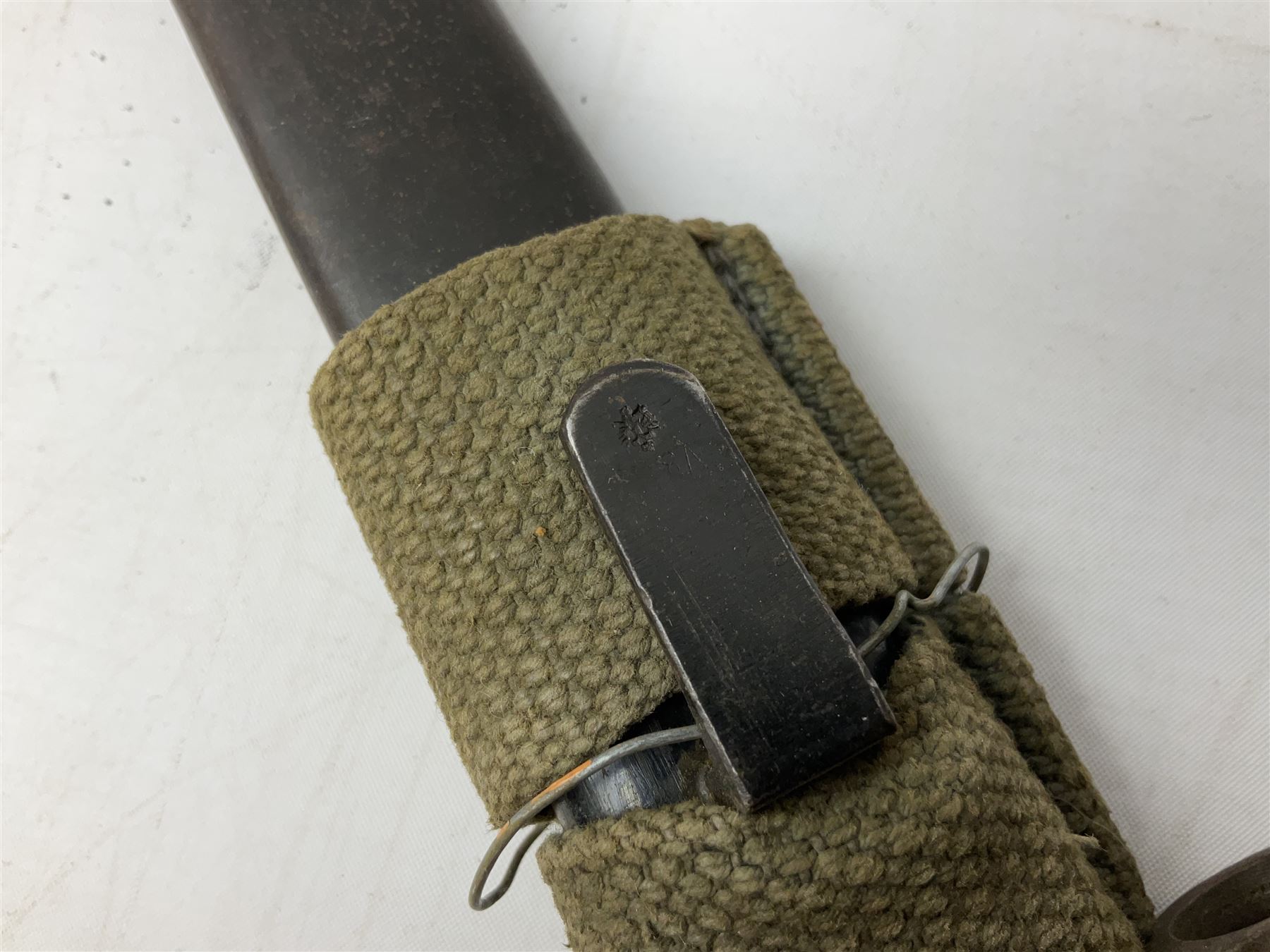 Austrian Model 1895 carbine NCO's knife bayonet with 25cm fullered steel blade; in steel scabbard with webbing frog L39cm overall; and Spanish Model 1941 Bolo bayonet with 25cm fullered steel blade No.6412D; in steel scabbard (2)