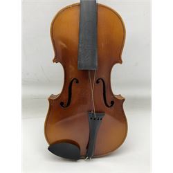 Czechoslovakian violin c1920 with 36cm two-piece maple back and ribs and spruce top, bears label 'Copy of Antonius Stradivarius Made in Czechoslovakia' L59cm; in carrying case; 1950s Czechoslovakian violin; and 195os Czechoslovakian three-quarter size violin; both cased (3)