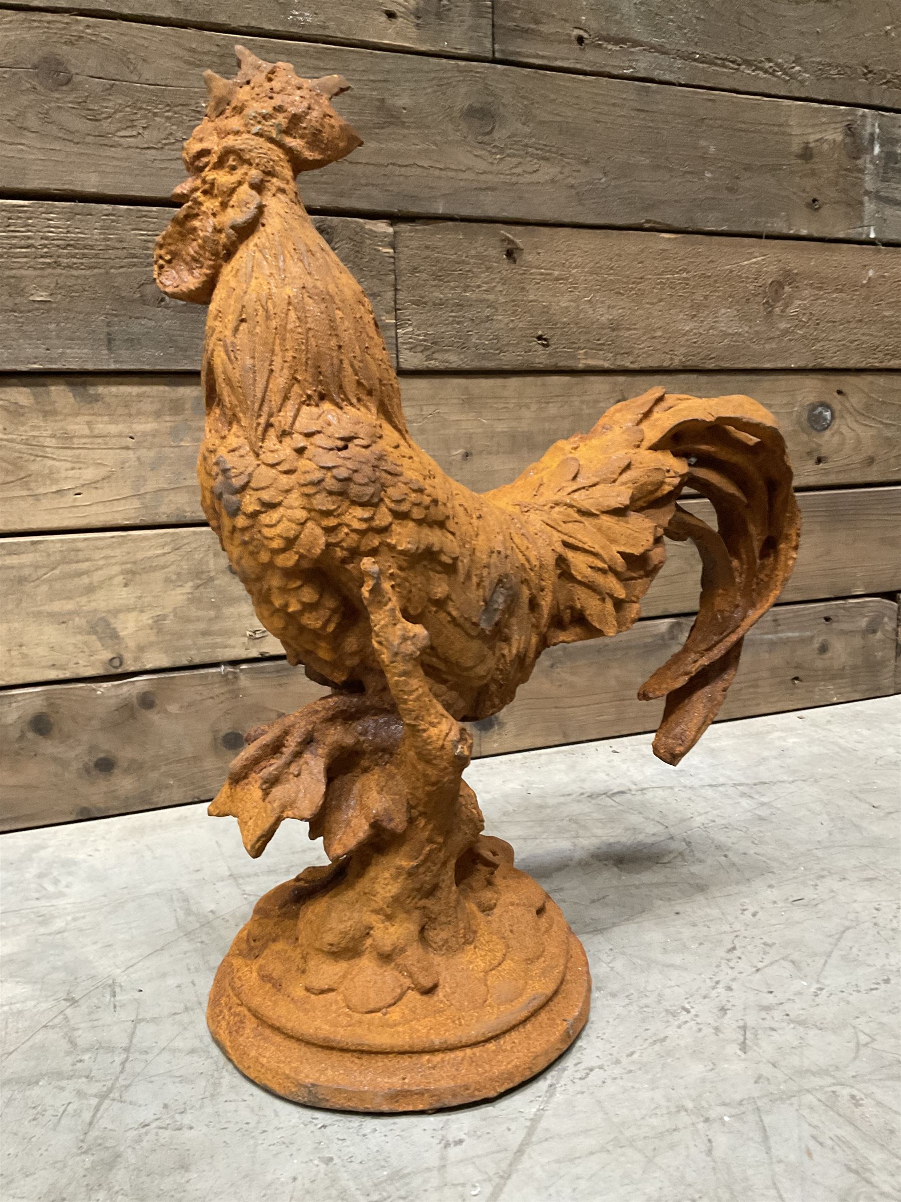Small weathered cast iron garden cockerel