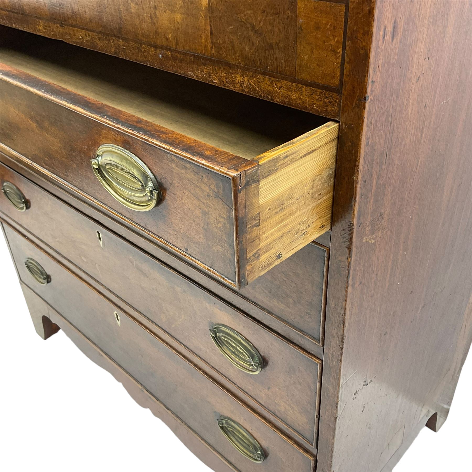 George III mahogany chest, rectangular crossbanded top over four long cock-beaded drawers with bone lozenge escutcheons and oval pressed brass handle plates, on bracket feet