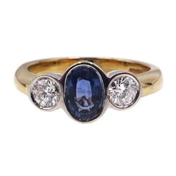 9ct gold three stone oval sapphire and round brilliant cut diamond ring, Birmingham 1998, total diamond weight approx 0.40 carat