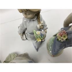 Nine Lladro figures, comprising Pocketful of Wishes no 7650, School Days no 7604, Picture Perfect no 7612 and six Flower Songs no 7607, largest example H27cm