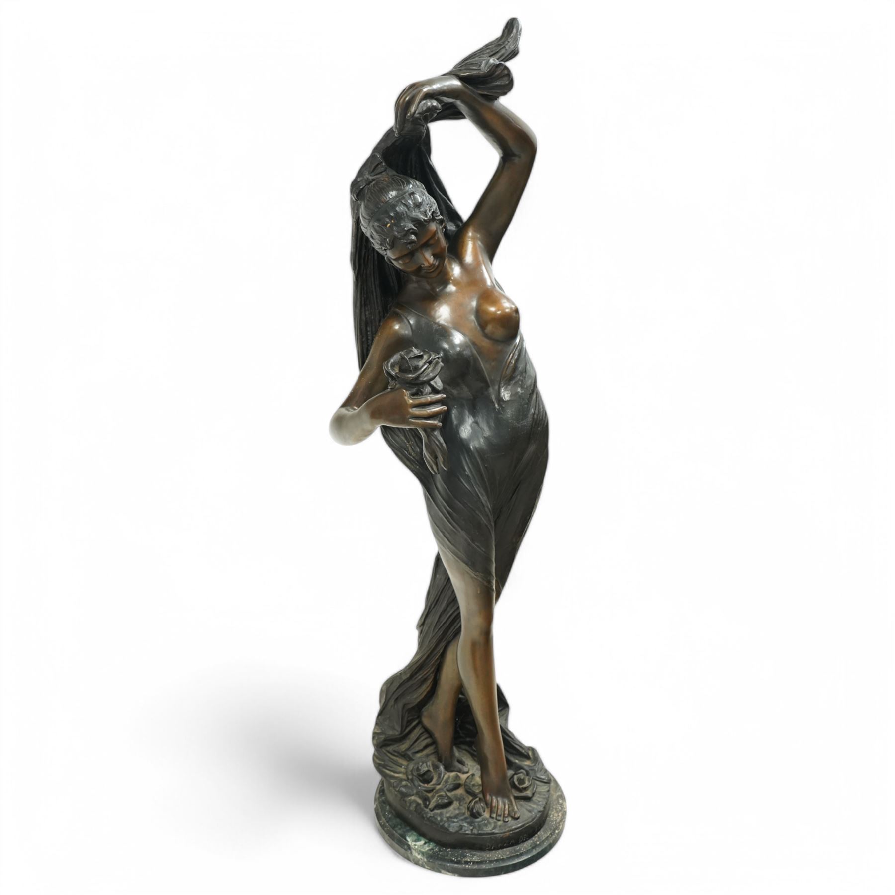 Giorgio Ceragioli (Italian 1861-1947): 'Danza Del Flori' -The Flower Dancer, large patinated bronze figure of a female dancer draped in a flowing garment and holding a rose, on a circular naturalistic floral base, on a marble plinth, signed and dated 1910, titled to the front, H140cm