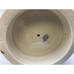 Late 19th century continental spill vase as a young girl standing beside an open tree trunk H21cm; and three German bisque figures (4)