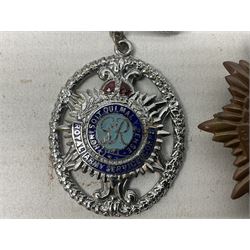 WW2 group of four medals comprising 1939-1945 War Medal, Defence Medal, Italy Star and 1939-1945 Star; with Royal Army Service Corps cap badge and RASC chrome and enamel sweetheart brooch