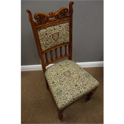  Set six Edwardian Arts & Crafts dining chairs, relief carved cresting rail, upholstered seats and backs with studding, turned supports with castors  