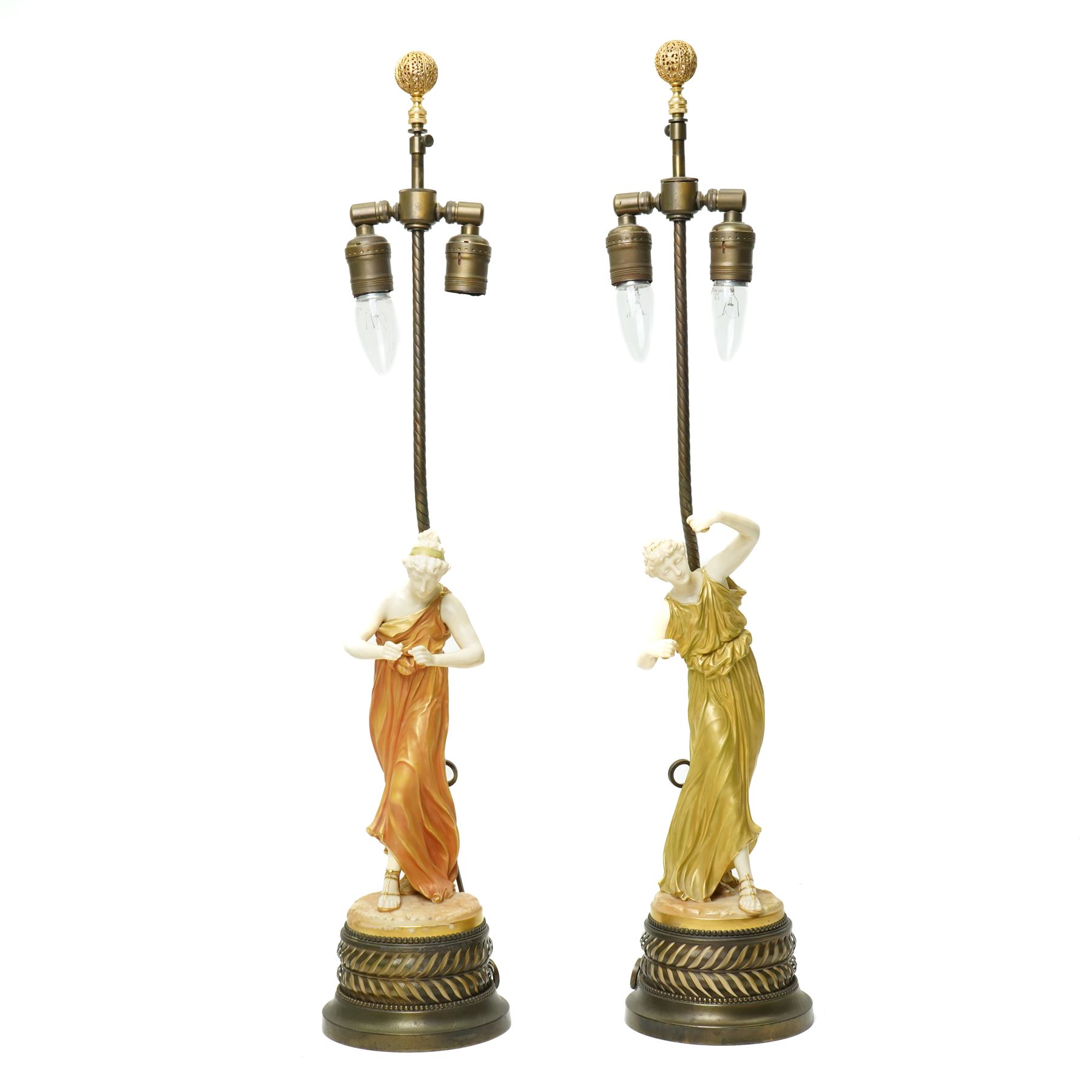 Pair of Royal Worcester table lamps modelled by James Hadley with female musicians with two branch metal fittings and filigree finials on circular bases H75cm