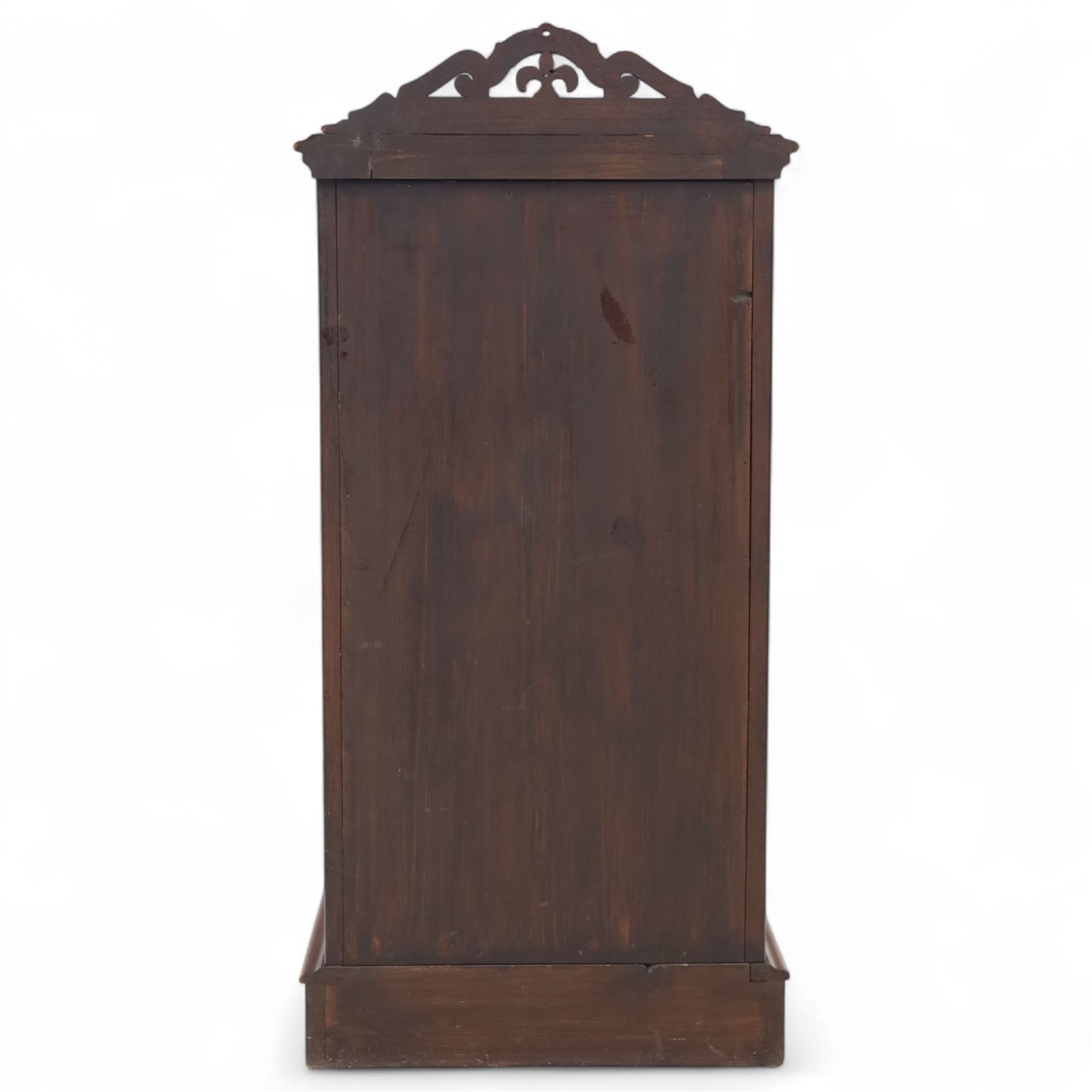 Pair of tall Victorian mahogany bedside chests, of narrow upright form, rectangular top with moulded edge, the back with raised pierced fretwork gallery, above four graduated drawers with knob handles, raised on a plinth base 