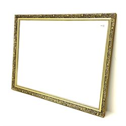 Rectangular bevelled mirror in gilt frame (112cm x 87cm), and a narrow bevelled mirror (2)