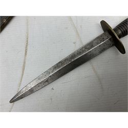 Fairburn and Sykes Commando fighting knife, 3rd pattern with 17cm double edged blade and copperised grip; no markings; in cut-down plain leather sheath L31.5cm