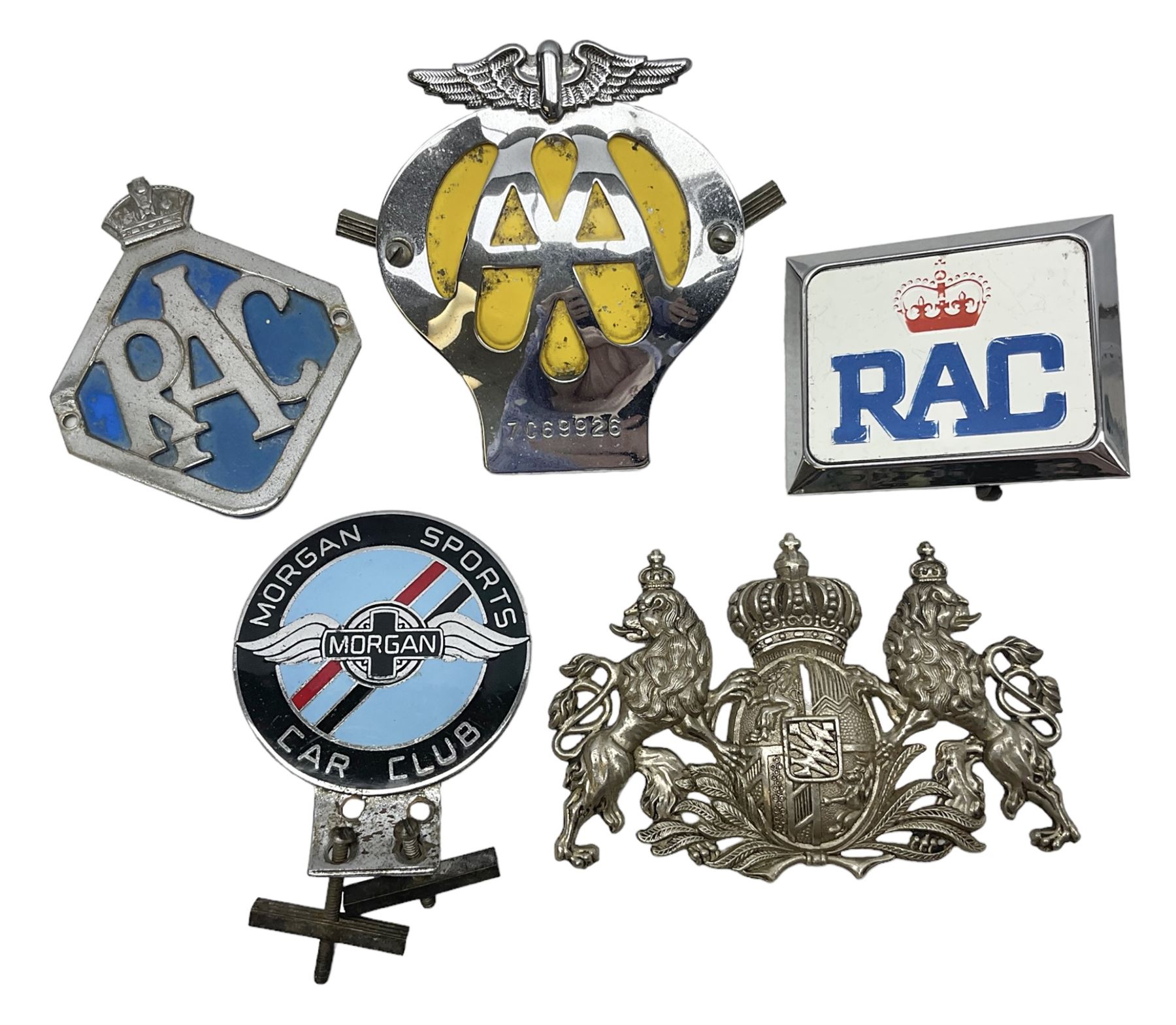 Four car badges, comprising two RAC, AA and a Morgan Sports Car Club example, together with a Royal Coat of Arms plaque (5)