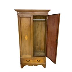 Edwardian inlaid mahogany wardrobe, projecting cornice over bevel edge mirrored door, single drawer below, on shaped apron with bracket feet
