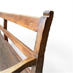Early 20th century pine and oak bench seat, stained pine rail back frame with shaped oak arms